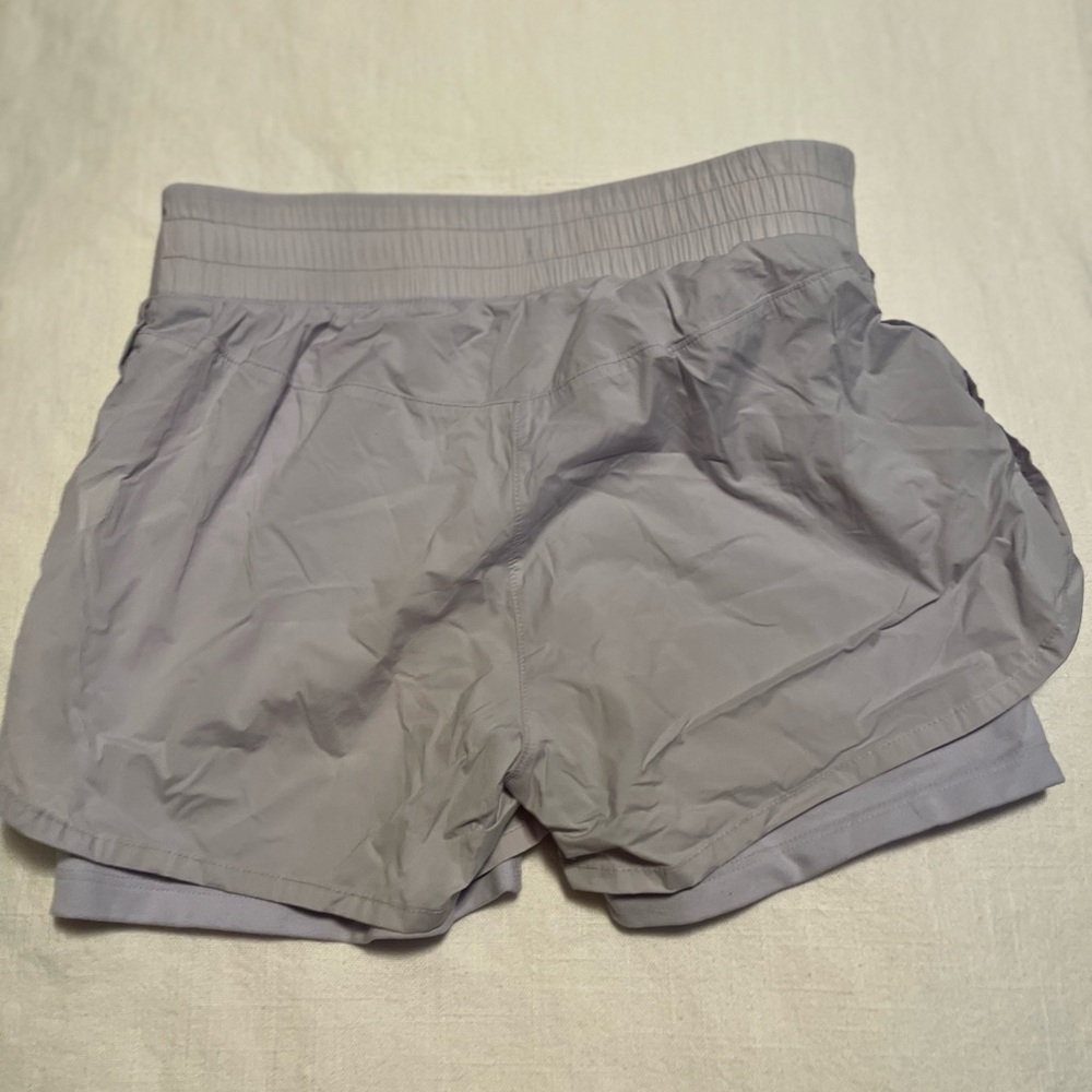Athleta Girl lavender athletic shorts 🍬
Size L12